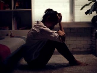 Business woman is depressed. She felt stressed and alone in the house.